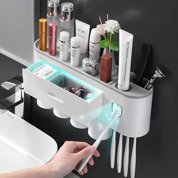 Giá kẹp tự bóp kem đánh răng
