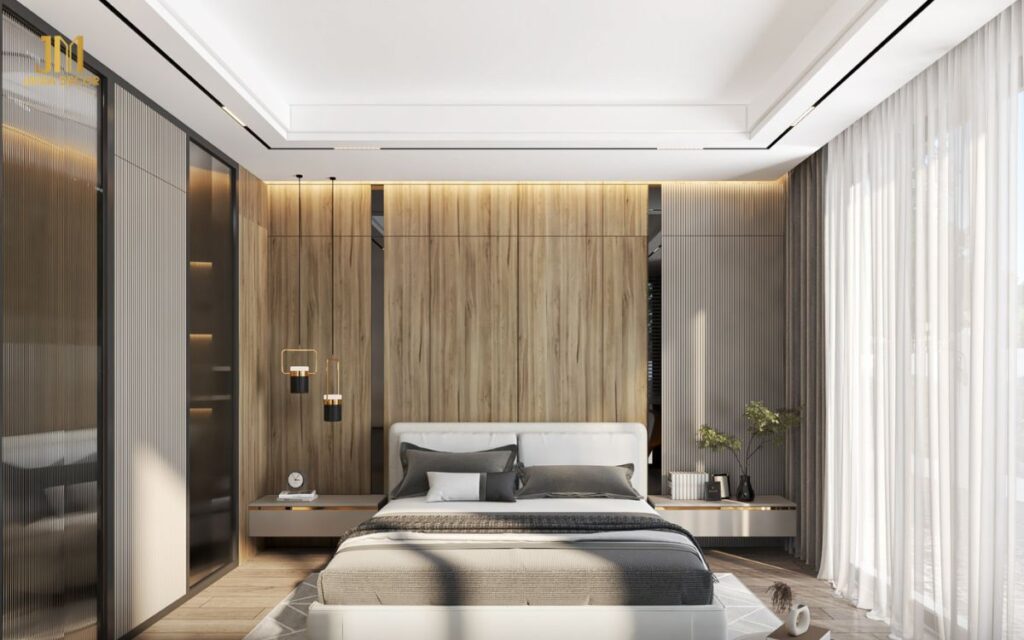 Sử dụng tủ quần áo âm tường để tối ưu hóa không gian lưu trữ và bố trí đèn led, đèn trần và đèn bàn để tạo không gian sáng và ấm