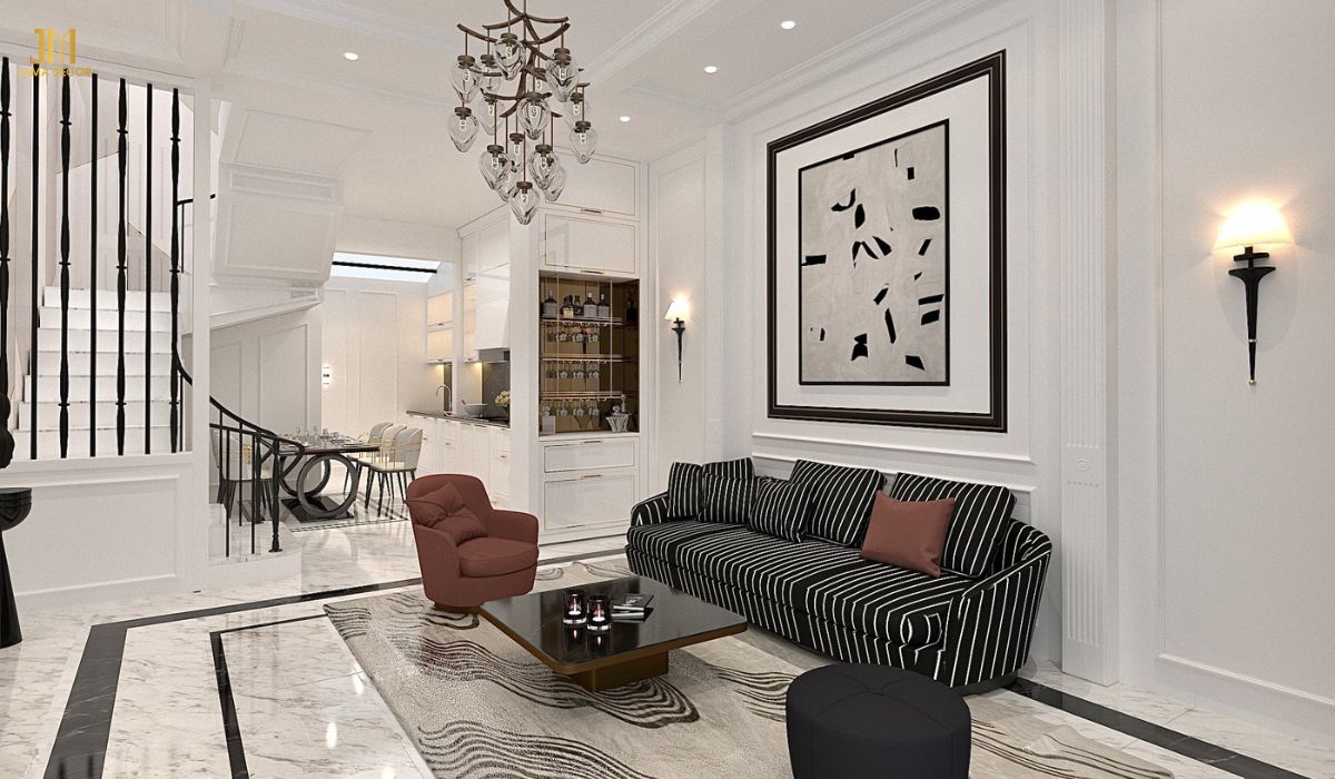 Kiểu dáng kẻ sọc của sofa giúp tạo nên sự tương phản thú vị, phá vỡ sự đơn điệu của không gian phòng khách