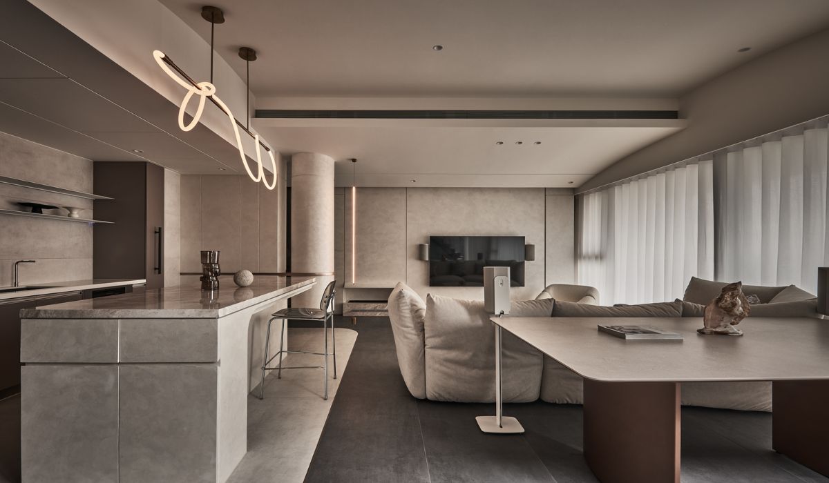 Mẫu phòng khách liền bếp này sử dụng gam màu lạnh, không cầu kỳ nhưng vẫn đầy nét cuốn hút