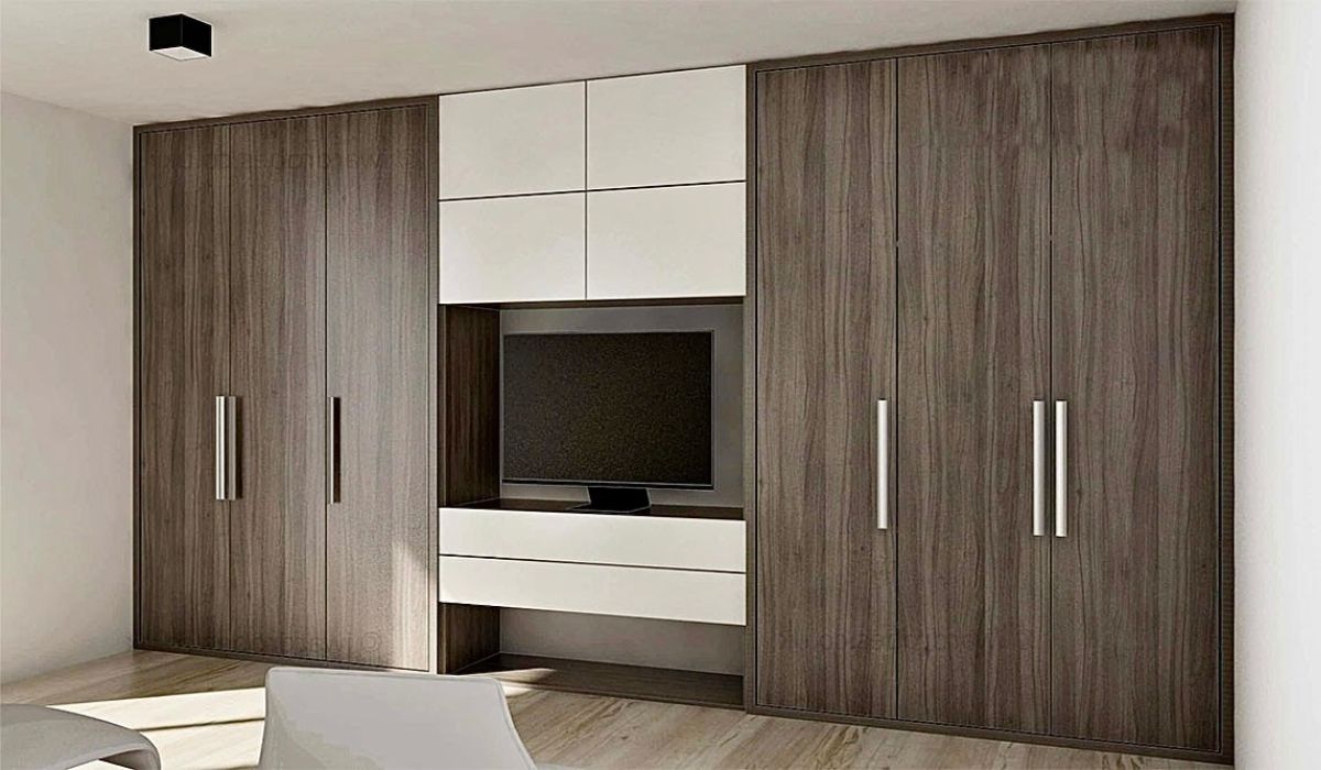 Kệ tivi trong phòng ngủ để giải trí tích hợp tủ quần áo sẽ giúp tiết kiệm không gian cho phòng khách