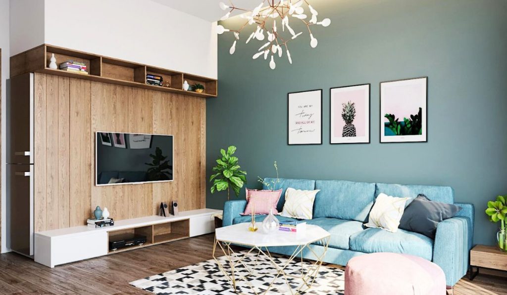 Trang trí vài chậu cây giúp không gian phòng khách trở nên xanh, mát mẻ hơn