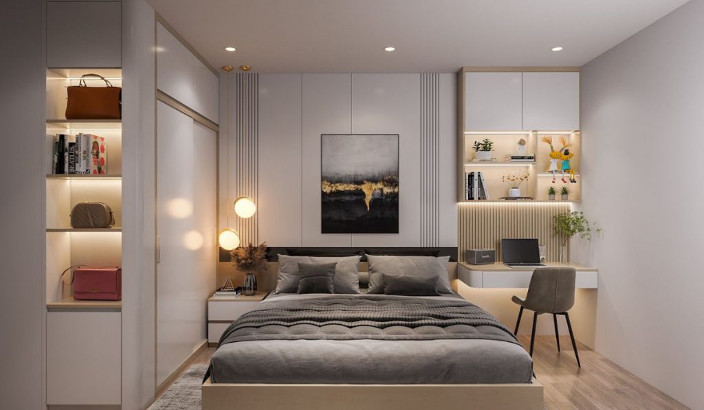 15+ Mẫu Thiết kế nội thất phòng ngủ 15m2 cho nhà nhỏ 4 Nội thất Phòng ngủ dành cho 2 vợ chồng hiện đại, trang trí tranh treo tường, tủ thiết kế xác tường. Ngoài ra có bàn trang điểm kết hợp với bàn làm việc và kệ sách