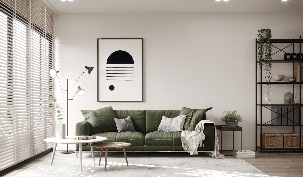 sofa màu xanh lá trong phòng khách màu trắng